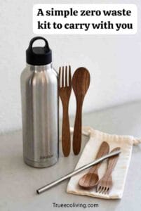 Flatlay of reusable bottle, cutlery set, cloth bag and straw on a table