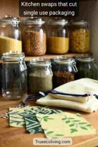 Reusable containers, beeswax wraps and produce bags on a kitchen counter